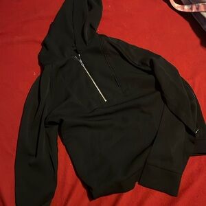 I am selling a black thin hooded sweatshirt.